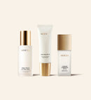 Summer-Proof Edit met witte en gouden Daily Face SPF 40, Changing Foundation en Final Touch Setting Spray.