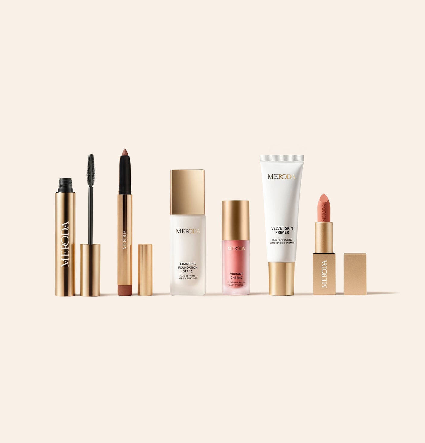 Endless Summer Bundle met Changing Foundation SPF 15, Gilded Lashes Mascara, Velvet Dream Lipstick, Vibrant Cheeks Blush, Eye Perfecting Shimmer Stick en Velvet Skin Primer op een lichte achtergrond