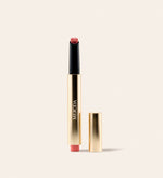 Hydrating Lip Tint in Peachy Rose in een elegante gouden verpakking voor een frisse en subtiele satijnglans.