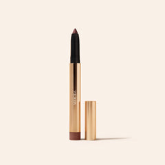 Meroda Eye Perfecting Shimmer Stick in Mauve geopend op een lichte achtergrond
