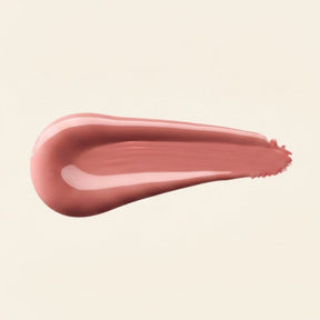 Mini Vibrant Cheeks Liquid Blush in Dusty Rose met een gladde textuur swatches op een neutrale achtergrond.