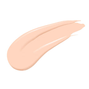 Universal Concealer textuur swatch in tint 2W met een romige finish op een witte achtergrond